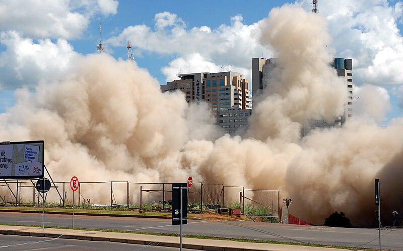 A building implodes